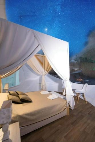 Postel nebo postele na pokoji v ubytování Bubble Tents