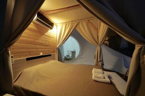 Postel nebo postele na pokoji v ubytování Bubble Tents