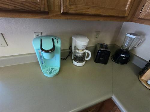 a kitchen counter with a coffee maker and a blender at Rr-edgewater13 in June Lake