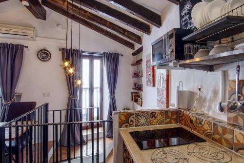 Η κουζίνα ή μικρή κουζίνα στο The Nook (El Recoveco)