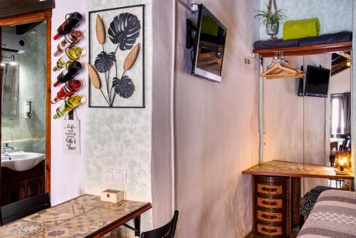 Ένα ή περισσότερα κρεβάτια σε δωμάτιο στο The Nook (El Recoveco)