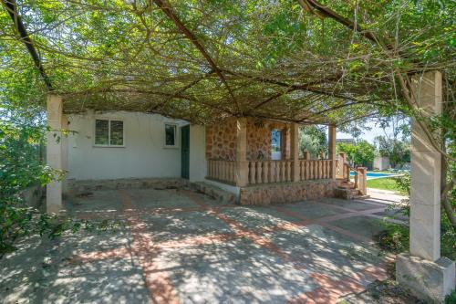 a house with a porch with a fence at Son Blau in Llucmajor