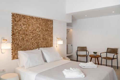 Ένα ή περισσότερα κρεβάτια σε δωμάτιο στο Galinos Hotel for adults only
