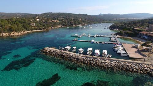 an aerial view of a harbor with boats in the water at Résidence de tourisme Les Hauts de l'Avena in Sartène