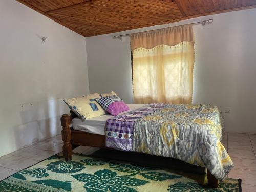 Ένα ή περισσότερα κρεβάτια σε δωμάτιο στο Joe & El Heritage Villa