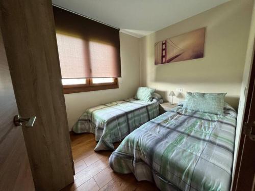 Posteľ alebo postele v izbe v ubytovaní Las Catedrales-Casa Canteiro 2