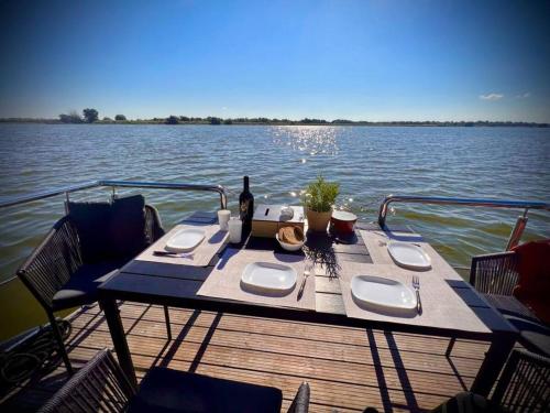 A restaurant or other place to eat at Danube Delta Houseboat