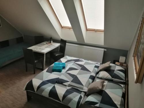 Postel nebo postele na pokoji v ubytování APARTMÁNY PIETRO