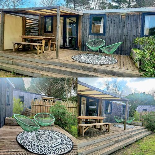 a house with a picnic table and chairs on a deck at Mobil-home in Biscarrosse