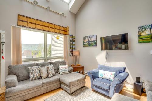 a living room with a couch and a chair at Windham Mountain Vacation Rental about 3 Mi to Lifts! in Windham