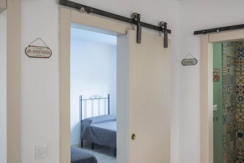 Postel nebo postele na pokoji v ubytování Casa Lidia
