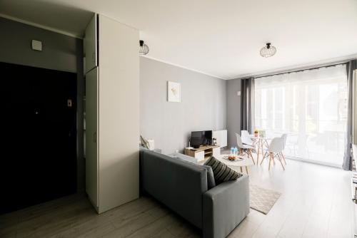 Μια τηλεόραση ή/και κέντρο ψυχαγωγίας στο Apartamenty Stare Zoo Zajezdnia