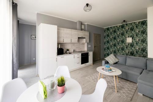 Η κουζίνα ή μικρή κουζίνα στο Apartamenty Stare Zoo Zajezdnia