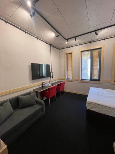 Televiisor ja/või meelelahutuskeskus majutusasutuses Art Hotel 158