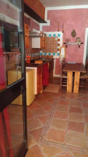 Кухня или мини-кухня в Appartamento con veranda 258

