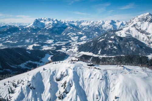 a view of a snow covered mountain with a ski slope at Apart Hotel Alpenhof Werfenweng in Werfenweng