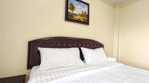 Postel nebo postele na pokoji v ubytování So View Phuket Resort