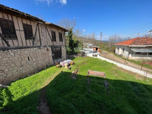 an aerial view of a yard next to a building at Tulipfaith Eco House in Safranbolu