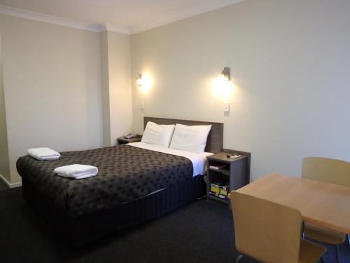 Werribee Motel and Apartmentsにあるベッド