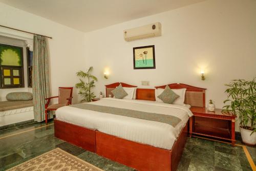Cama o camas de una habitación en Swaroop Vilas - Lake Facing Boutique Hotel