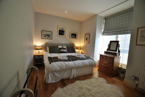 מיטה או מיטות בחדר ב-2 Melville Terrace Anstruther