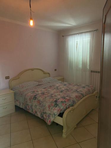 Een bed of bedden in een kamer bij Villa piccola