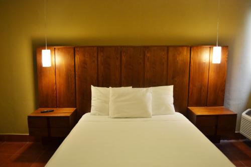 Hotel Los Altos Esteliにあるベッド