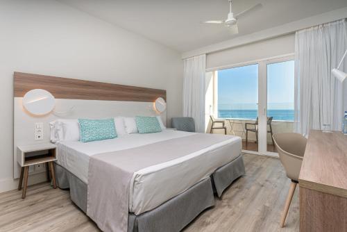 Katil atau katil-katil dalam bilik di Hotel Benalma Costa del Sol
