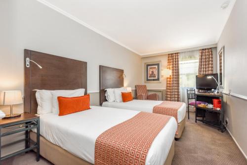 Katil atau katil-katil dalam bilik di Mercure Johannesburg Randburg