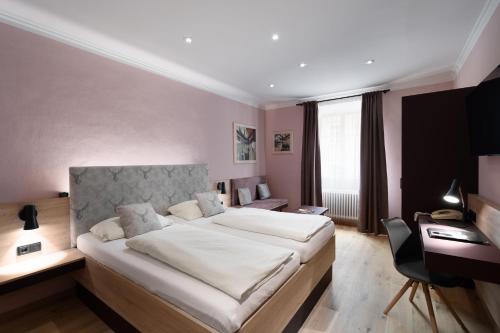 Posteľ alebo postele v izbe v ubytovaní Altstadthotel Kasererbräu