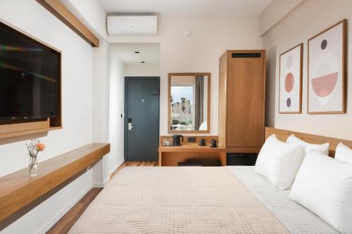 Kos Divine Hotel & Suitesにあるベッド