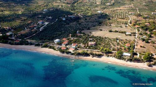 an aerial view of a beach and the ocean at Seaside Getaway - Aelia Villa's Dreamy Paradise in Petalidhion