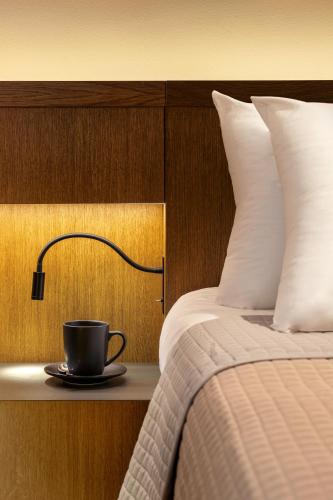 Kos Divine Hotel & Suitesにあるベッド