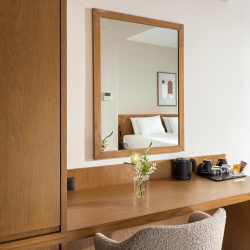 Kos Divine Hotel & Suitesにあるベッド