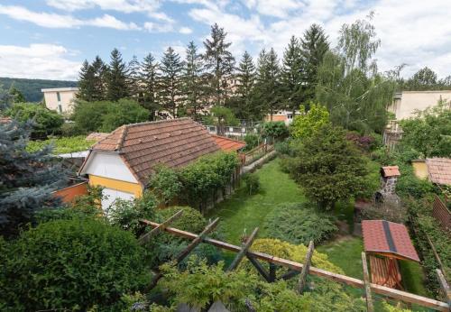 an aerial view of a garden with a house at Charming two bedrooms apartment in Sighişoara