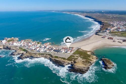 an aerial view of a small island in the ocean at Sofia House - Baleal Island, Ocean view patio and bedroom in Ferrel
