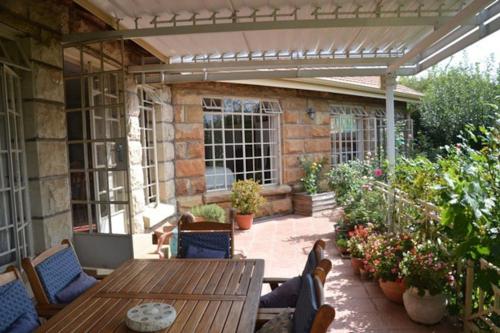 Κήπος έξω από το Goedgeleë Self Catering