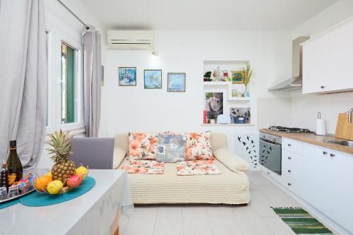 Η κουζίνα ή μικρή κουζίνα στο Island Getaway apartments Mljet
