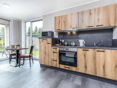 Kuchyň nebo kuchyňský kout v ubytování Kronenburger Couples Bungalow