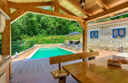 Cozy stone house CAPREE with pool – Photos 4