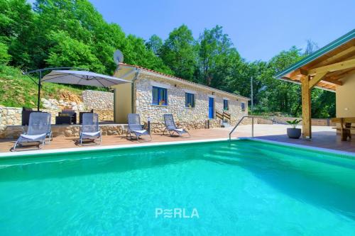 Cozy holiday house CAPREE with pool in a quiet location near the beach Rabac