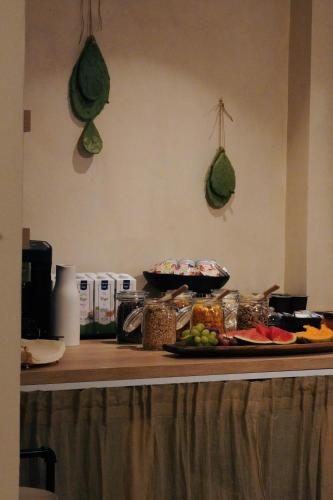 a counter top with food on a table with food at lo͝or luxury retreat in Split