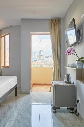 Ένα ή περισσότερα κρεβάτια σε δωμάτιο στο Song Anh 1 Hotel