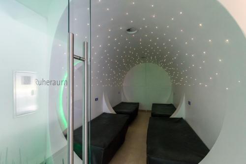 a room with a ceiling with stars on it at Hotel Schloss Montabaur in Montabaur