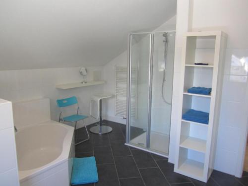 a bathroom with a shower and a sink and a toilet at ARLALPIN in Pettneu am Arlberg
