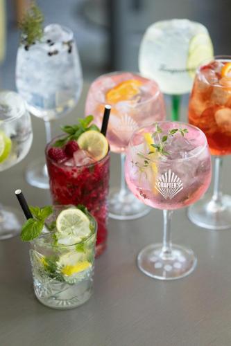 a group of wine glasses sitting on a table at Georg Ots Spa Hotel in Kuressaare