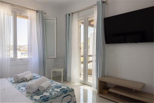 Amaris Mykonian Residenceにあるテレビまたはエンターテインメントセンター