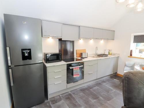 Una cocina o zona de cocina en Lands Brow Lodge