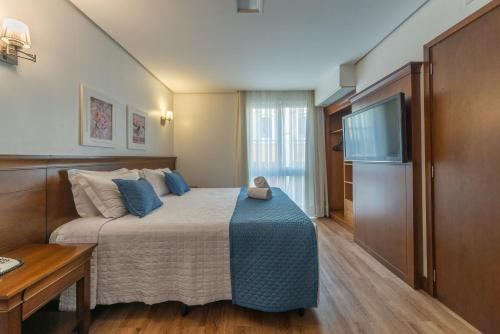 Hotel Monte Felice Centroにあるベッド