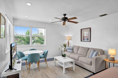 a living room with a couch and a table at Suite #1 - Marine Villas Hollywood - 1 Bedroom in Hollywood